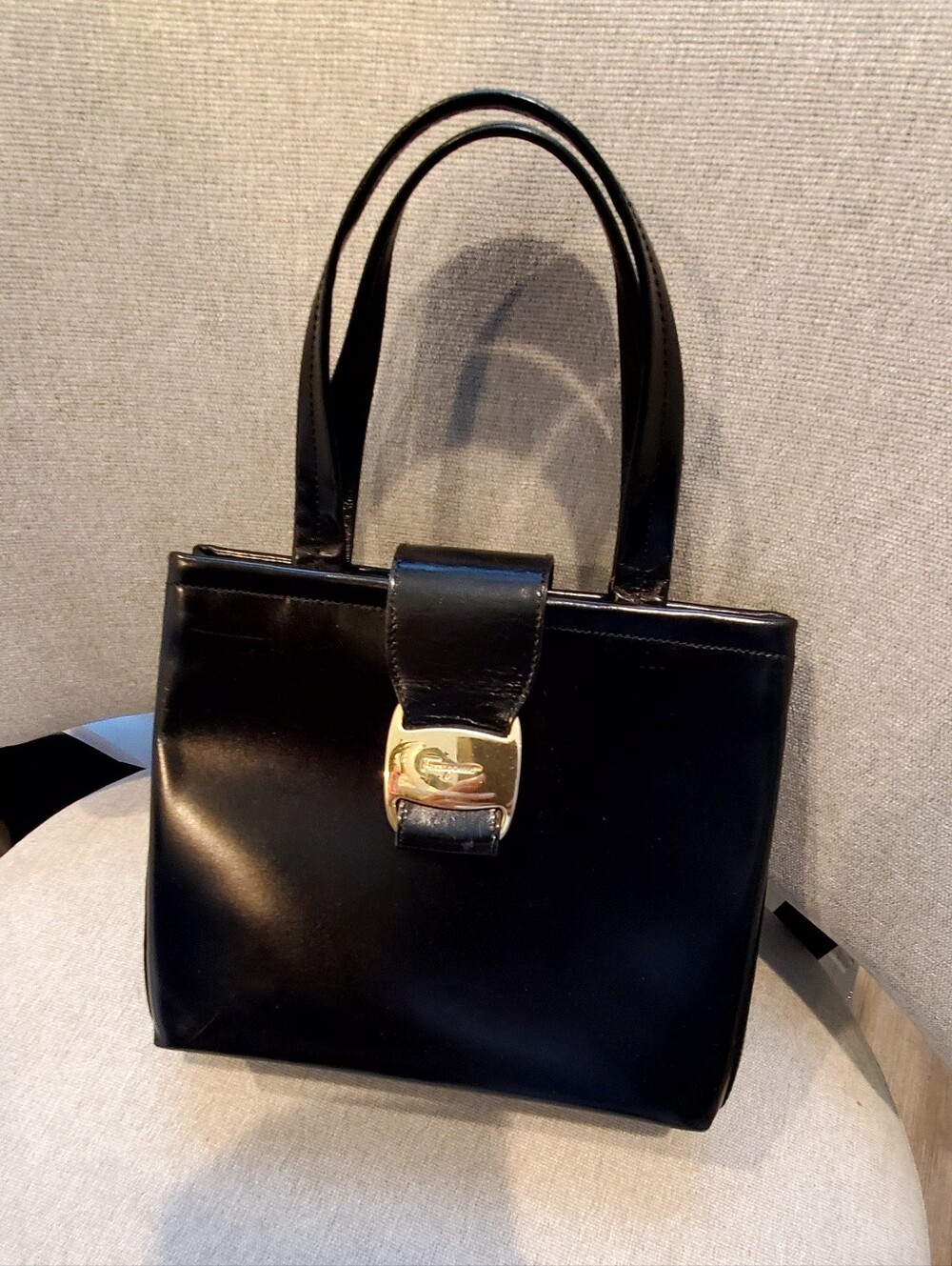 Classic Ferragamo Black Leather Tote Bag with Gold Buckle